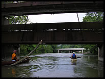 paddling under "Guillotine Dam"